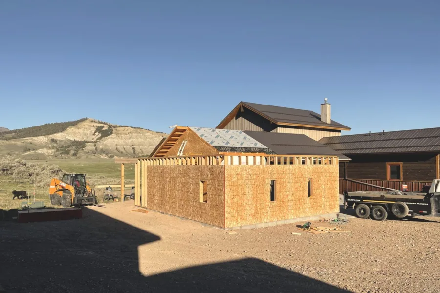 Exterior walls standing on the new slab